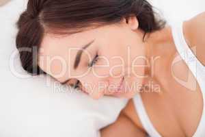 Peaceful woman lying while sleeping