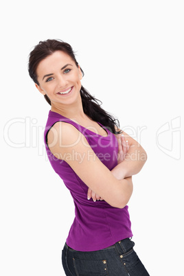 Blue eyed woman with folded arms