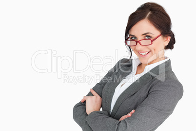 Attractive secretary with arms folded