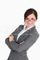 Attractive blue eyed secretary with folded arms