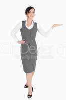 Happy well-dressed woman with her palm facing upwards