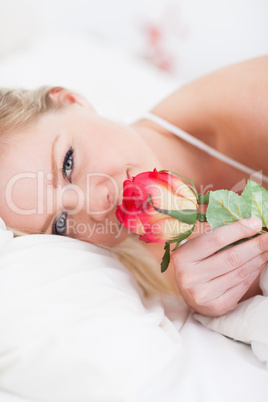 Young woman with a rose