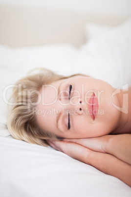 Young woman sleeping with make up on her face