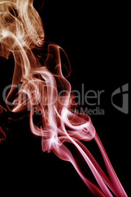 wave and smoke of different colors on black background