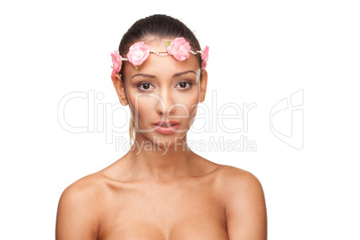 Beautiful young woman with a floral arrangement