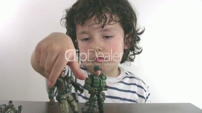 Little boy playing toy