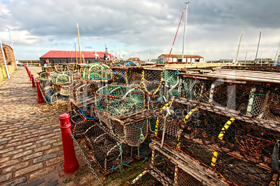 Lobster pots at a small Scottish harbour