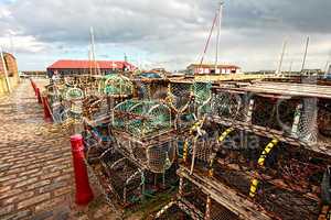 Lobster pots at a small Scottish harbour