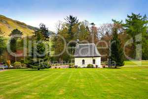 Springtime landscape with an old, white chapel, Scotland