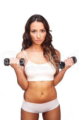 Sexy woman working out with dumbbells