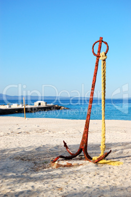 Anchor on the beach and turquoise water at the modern luxury hot