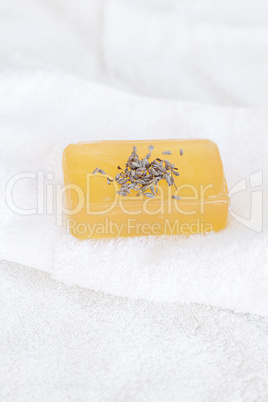 soap and lavender on a white towel