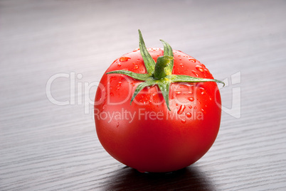 Tomato on dark  background