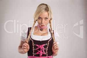 woman with dirndl and plaits