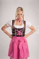 woman with dirndl is angry