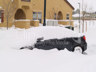 Car Buried in the Snow