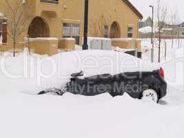 Car Buried in the Snow