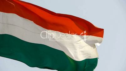 Hungarian flag is fluttering in wind.