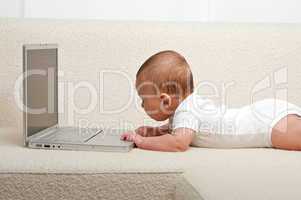 Baby with a computer