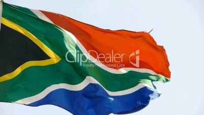 South African flag is fluttering in wind.
