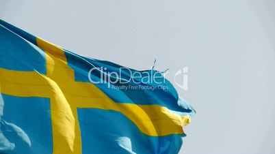 Sweden flag is fluttering in wind.