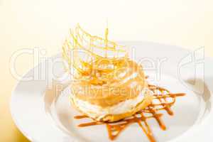 Delicious creamy dessert with caramel topping