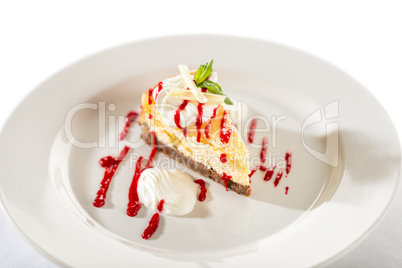 Delicious cheesecake with raspberry sauce