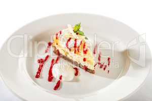 Delicious cheesecake with raspberry sauce