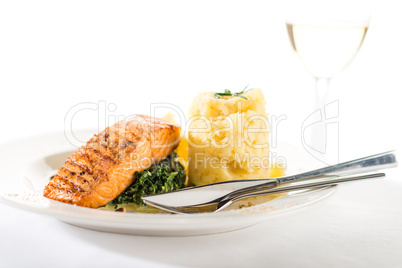 Salmon steak with spinach and mashed potatoes
