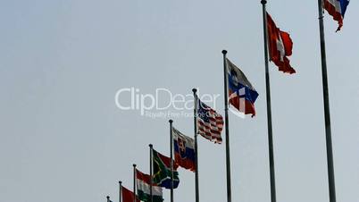 Many national flags fluttering in wind.American-flag.
