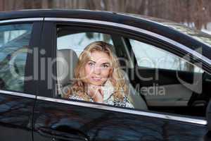 Young woman in the car