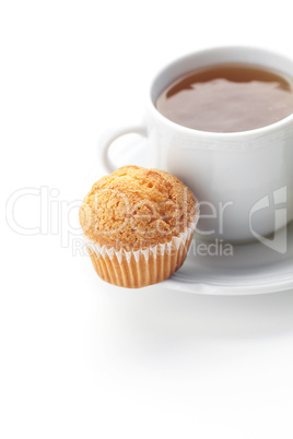 cup of tea and muffin isolated on white