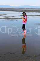 Young Asian Girl Exploring In The Ocean