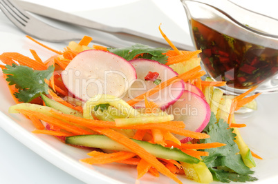 Salad with carrot, cucumber and radish