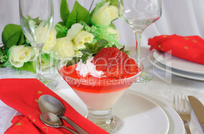 Dessert of yogurt with strawberry jelly