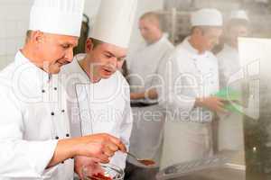 Professional kitchen chef cook add spice food