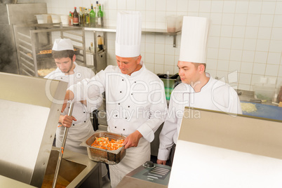 Professional chef cook prepare food in kitchen