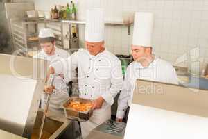 Professional chef cook prepare food in kitchen