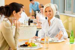 Cafeteria lunch young business woman eat salad