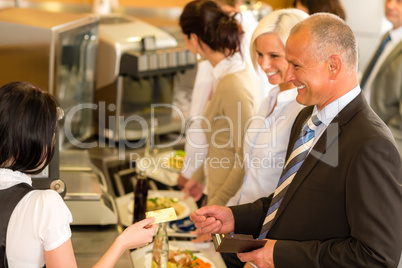 Cafeteria business man pay by credit card cashier