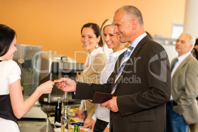 Cafeteria business man pay by credit card cashier