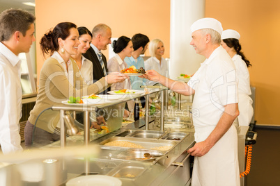 Office woman in canteen cook serve meals