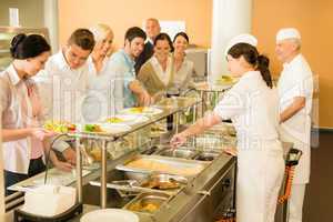 Office woman in canteen cook serve meals