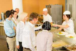 Office woman in canteen lunch-lady serve meals