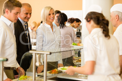 Business colleagues cook serve lunch canteen food