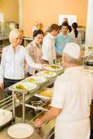 Business colleagues cook serve lunch canteen food