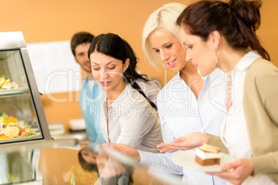 Cafeteria food young woman choose dessert