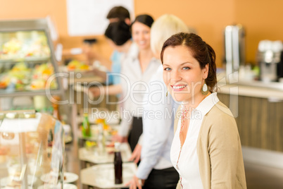 Business woman take cafeteria lunch smiling