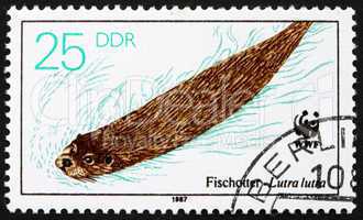 Postage stamp GDR 1987 Otter Swimming