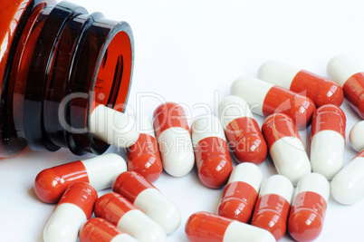 Red-and-white capsules